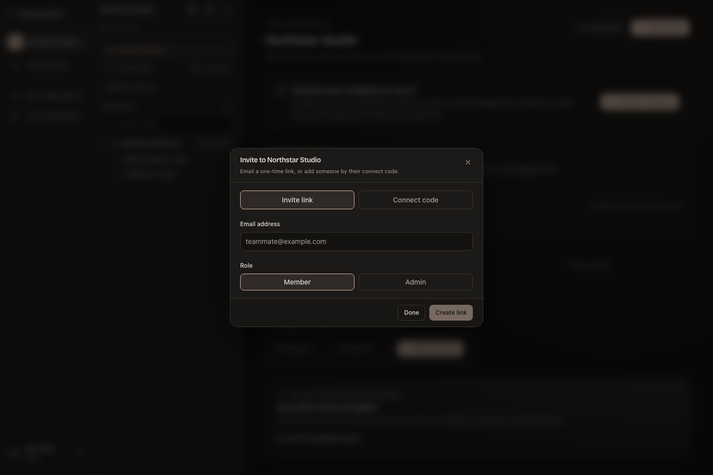 The organisation invitation dialog with email and role controls.